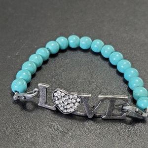 ***Final Sale*** Silver tone love bracelet with turquoise stone